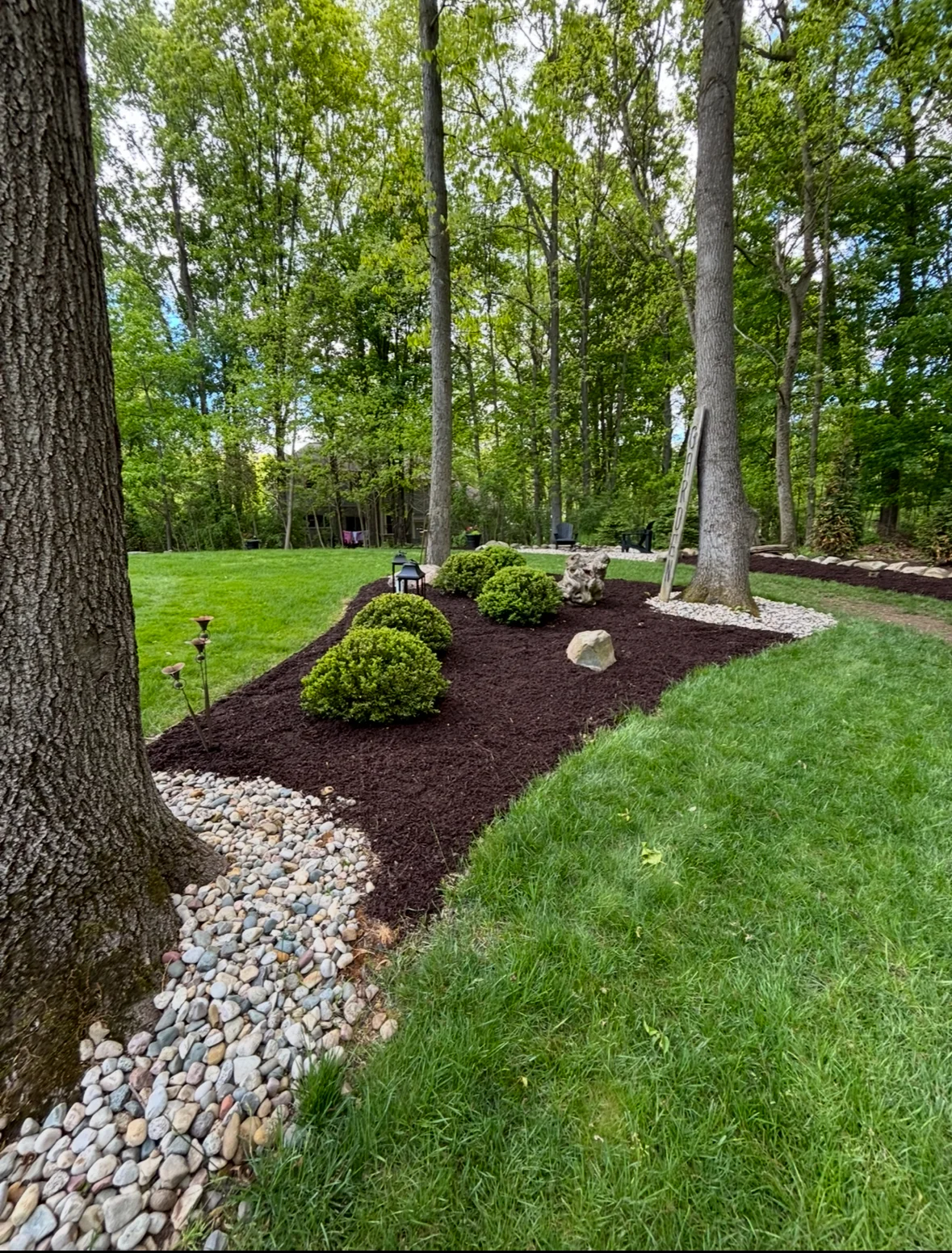 Trees and rock landscaping in Milford, MI